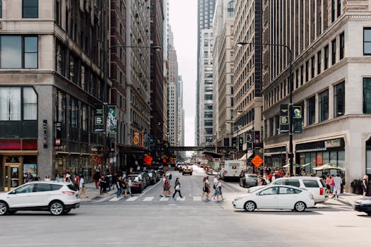 Dynamic cityscape showcasing pedestrians walking among skyscrapers and vehicles.